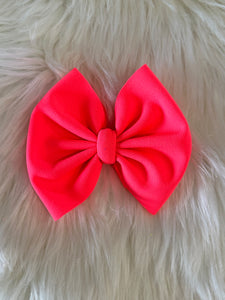 Neon coral bow